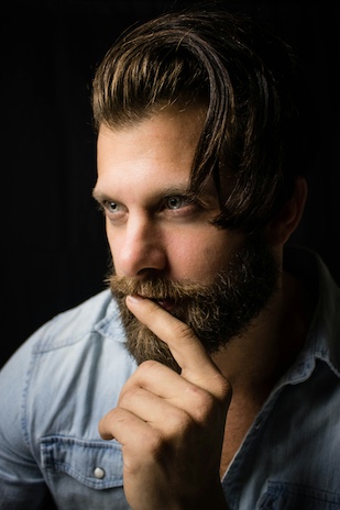 man considering beard